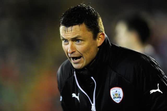 Barnsley's caretaker mananger Paul Heckingbottom will hope his team can clinch a League One play-off place with victory over Colcehster United on Saturday.