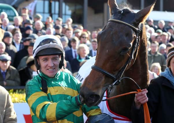 Jockey Barry Geraghty celebrates winning the Bibby Financial Services Ireland Punchestown Gold Cup on Carlingford Lough.