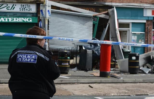Police cordon off a Post Office in lower Baildon, Bradford, after a cash machine was blown up by raiders. Picture: Ross Parry Agency