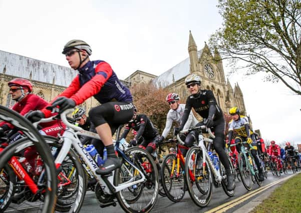 The Tour de Yorkshire passes Beverley Minster.