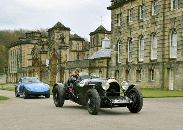A 1928  Stanley Mann Racing Bentley  followed by a 1969 WSM bodied Austin Healey Sprite make their way past  Castle Howard