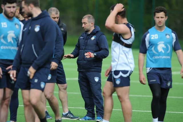 Yorkshire Carnegie coach Bryan Redpath chats with assistant James Lowes during a training session earlier this week.  Picture: Tony Johnson.