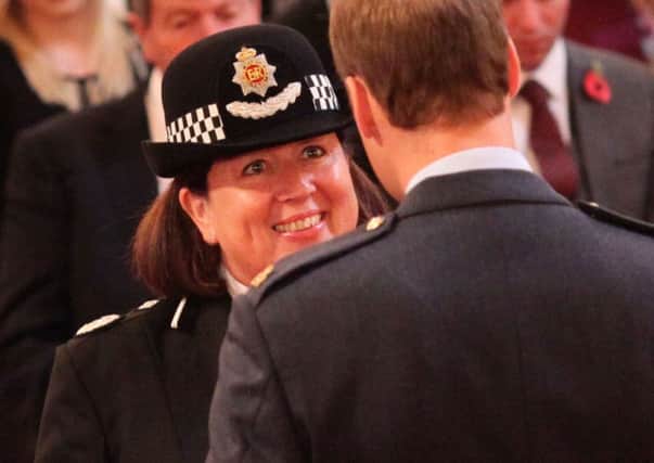 Dawn Copley is decorated with the Queen's Police Medal last October by Prince William at Buckingham Palace