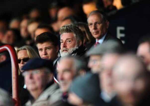 York's chairman Jason McGill watches from the stands in the recent game agai9nst Portsmouth.
 Picture: Jonathan Gawthorpe