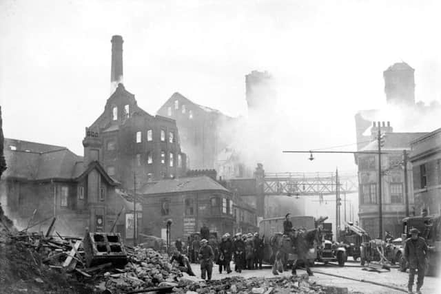 Fire engines in attendance at Ranks flour mill in Hull which was destroyed by bombing in May 1941.