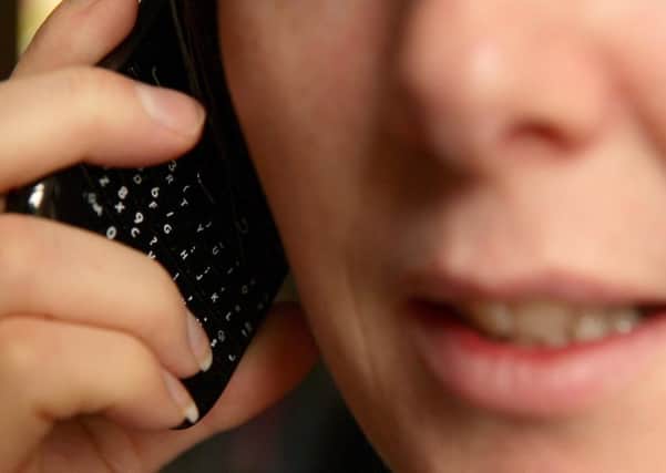 Pictured posed by model: Nuisance telephone calls continue to infuriate readers.