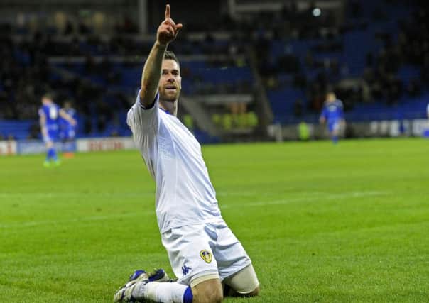 Leeds striker Mirco Antenucci salutes the travelling fans after scoring at
Cardiff.
Picture: Bruce Rollinson
