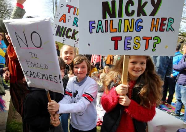 Children at a rally with their parents in protest at controversial Sats tests for six and seven-year-olds.