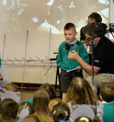 Jack Wray, Y2, asks Tim Peake "How tall are you now on the ISS?" Picture by Bruce Rollinson