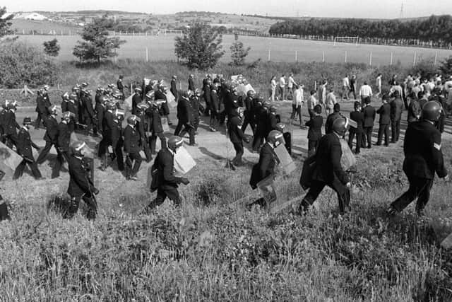 MINERS STRIKE June 18th 1984
Pickets are moved on by police at Orgreave and usher them towards Catcliffe.