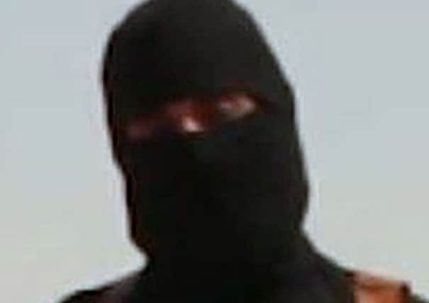 Screen grab taken from footage issued by Islamic State militants of the British extremist known by the nickname 'Jihadi John'. Pic: PA