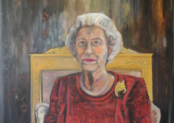 Dan Llywelyn Hall, of his latest portrait of Queen Elizabeth II entitled  'The Enduring Monarch' , which shows the Queen sitting in the same position wearing the same outfit but from a different angle as a portrait he unveiled of her in 2013.