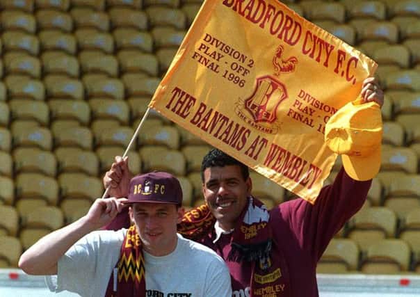 COMEBACK KINGS: Bradford manager Chris Kamara and captain Eddie Youlds get in the Wembley mood after defeating Blackpool 3-2 on aggregate in the semi-finals. Picture: Ross Parry