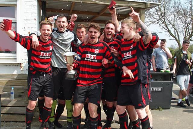 The West Pier lads celebrate their 3-2 Senior Cup final win against Traf 152187