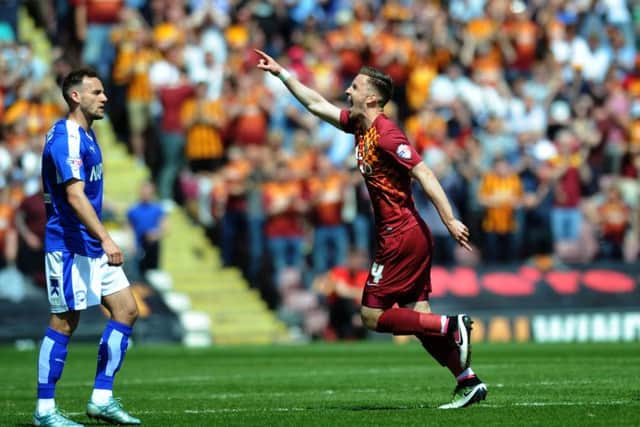 Bradford's Lee Evans celebrates his side's opening goal against Chesterfield on Sunday afternoon. The Bantams now face Millwall in the play-off semi-finals. 
Picture: Jonathan Gawthorpe