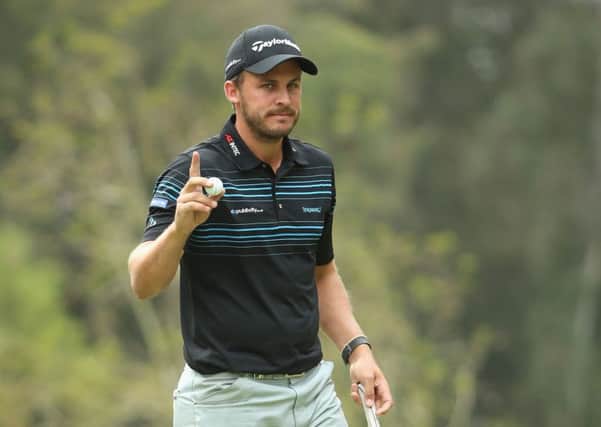 Huddersfield's Chris Hanson acknowledges the crowd after his birdie on the 18th hole during the third round of the Hassan trophy (Picture: Andrew Redington/Getty Images).