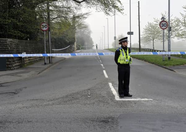A police cordon in place on Potternewton Lane yesterday morning. Picture: Steve Riding.