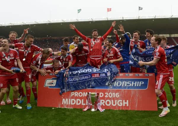 Middlesbrough celebrate their promotion to the Premier League after the Sky Bet Championship match at the Riverside Stadium. Picture: Anna Gowthorpe/PA