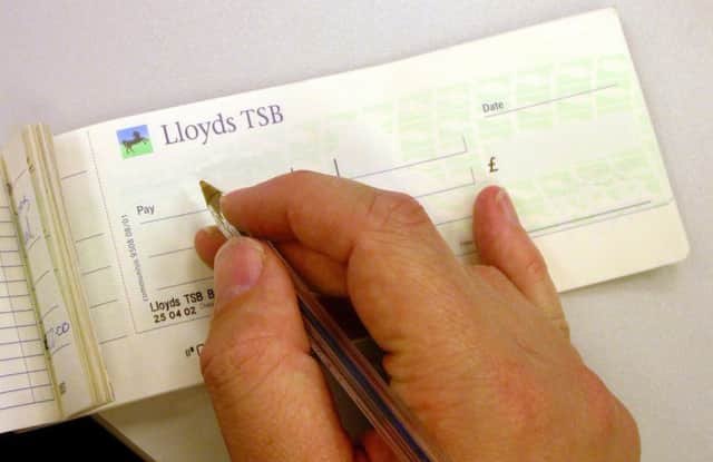Many consumers value their cheque books Photo: PA Wire