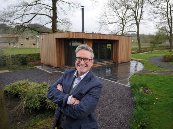 Max is thrilled with his cedar-clad  garden room, which the family have named the Max Cave
