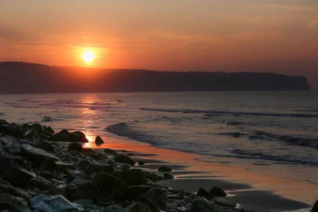 Sunset over the beach at Whitby on Sunday night, May 8. Image: SWNS - Leeds