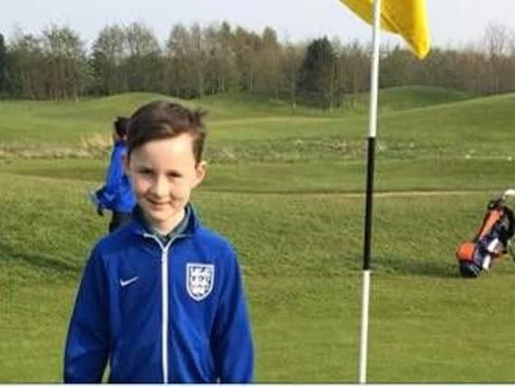 Mason Smith went within a foot of achieving Cookridge Hall GC junior academy's first hole in one.