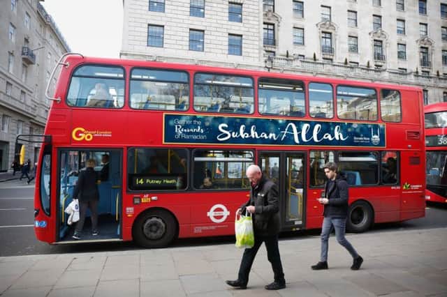 A bus carrying an advert praising Allah as part of a fundraising drive by Britain's biggest Islamic charity during Ramadan.