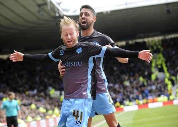 Sheffield Wednesday's Barry Bannan celebrates his goal with Marco Matias at Derby.