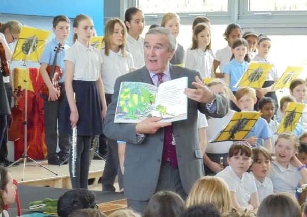 Dr Gervase Phinn opening the new library at Beecroft Primay School in Kirkstall