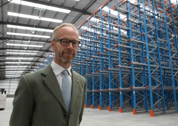 Richard Page, Managing Director of Inspired Pet Nutrition, in new warehouse at Dalton.