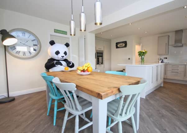 Lee Wilson dressed as a panda to promote his home in Cherry Burton