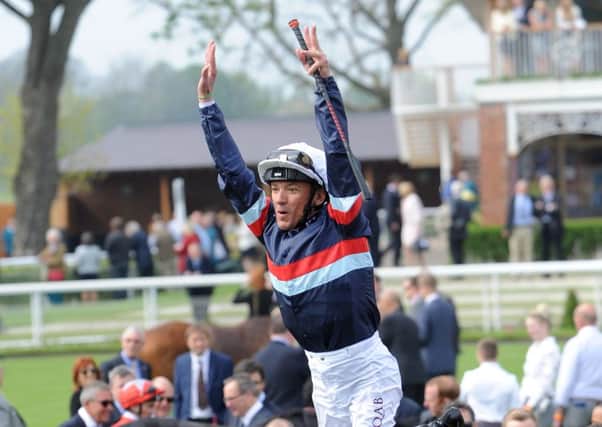 Frankie Dettori dismounts after winning The Duke of York Clipper Logistics Stakes on Magical Memory.