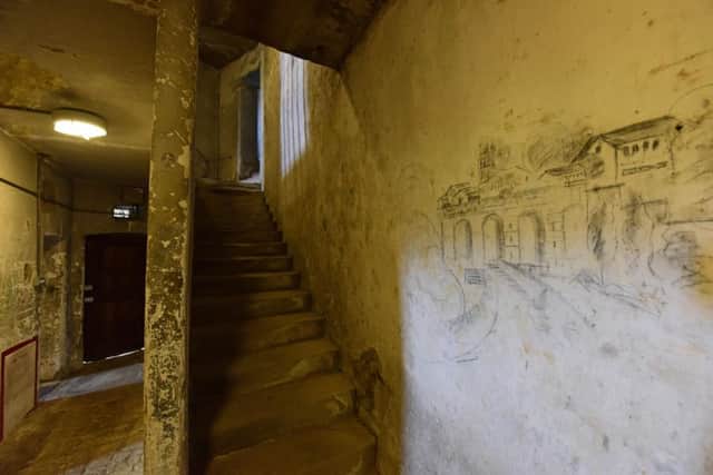 The cells at Richmond Castle in North Yorkshire. Graffiti left there by conscientious objectors during the First World War will beconserved by English Heritage, thanks to a major Â£365,400 grant from the Heritage Lottery Fund (HLF). Photograph: Anthony Chappel-Ross for English Heritage.