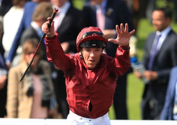 Frankie Dettori celebrates with his trademark dismount after winning the Betfred Dante Stakes onboard Wings of Desire at York yesterday (Picture: Mike Egerton/PA).