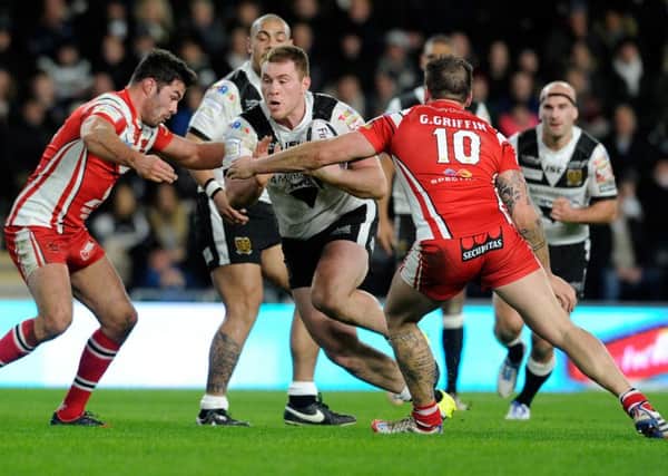 Hull FC's Scott Taylor pushes forward against Salford Red Devils. Picture: Bruce Rollinson
