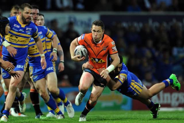 Luke Dorn launches an attack for Castleford Tigers as they overwhelmed champions Leeds Rhinos at Headingley (Picture: Jonathan Ggawthorpe).