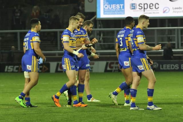Leeds Rhinos players at the end of their defeat to Caslteford Tigers.