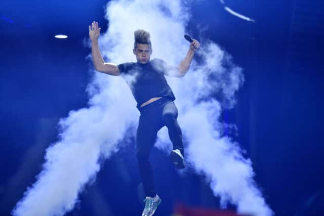 Lithuania's Donny Montell performs the song 'I've Been Waiting for This Night' during the second Eurovision Song Contest semifinal