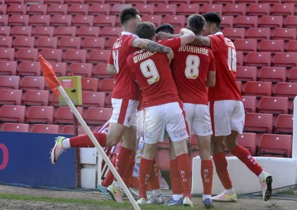 Adam Hammill celebrates his opening goal for 
Barnsley against Walsall. (Picture: Bruce Rollinson)