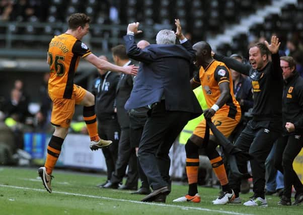 Hull City are jubilant after Andrew Robertson's strike late into stoppage time (Picture: Tony Johnson).
