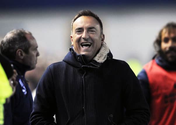 Sheffield Wednesday's2-0 win over Brighton brought a smile to head coach Carlos Carvalhal's face but he insists the tie is not over (Picture: Steve Ellis).