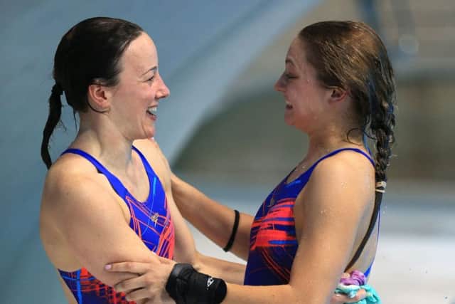 City of Leeds's Alicia Blagg (right) and Rebecca Gallantree celebrate after winning the silver medal in the Women's Synchronised 3M Final. Picture: Nigel French/PA.