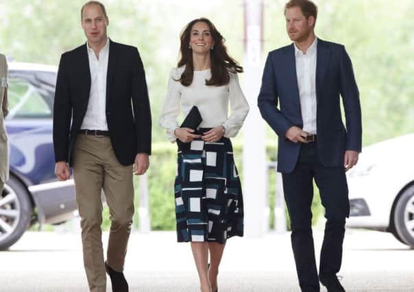 The Duke and Duchess of Cambridge and Prince Harry (right) arriving at the Queen Elizabeth Olympic Park in east London where they launched Heads Together - their new campaign to end mental health stigma.  Pic: Yui Mok/PA Wire