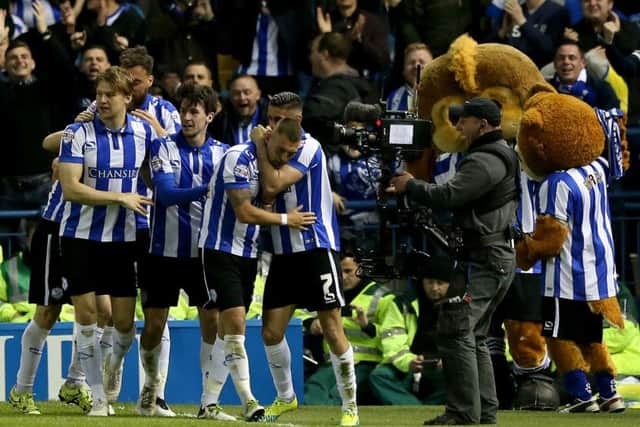 Sheffield Wednesday's Kieran Lee (centre) celebrates scoring his side's second goal of the game with teammates during the Sky Bet Championship playoff, Semi final, first leg match at Hillsborough, Sheffield. (Picture: PA)