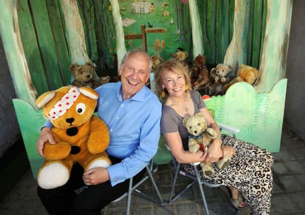 Gyles Brandreth
Gyles and his wife, Michele Brown, with one of the  tableaux. Gyles is holding Pudsey
.Picture by Simon Hulme