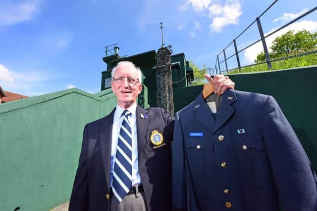 Former Group Commandant Jim Millington with his uniform, which was donated to the bunker when English Heritage opened it to the public. Picture: Anthony Chappel-Ross
