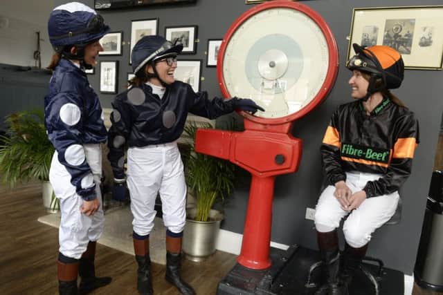 Debra Boyes, Rebecca Robinson and Julie Kelshaw in the old weighing room at York Racecourse.
