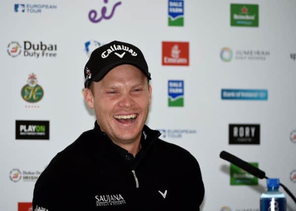 Danny Willett enjoys a joke with the media ahead of a practice round prior to the Dubai Duty Free Irish Open (Picture: Ross Kinnaird/Getty Images).