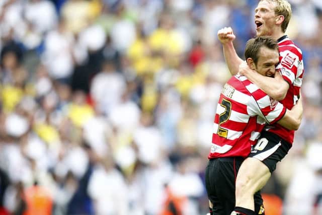 Doncaster Rovers' Paul Green (r) and James Hayter celebrate after beating Leeds United in the 2008 League One play-off final.