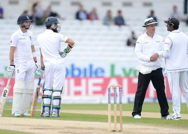 Umpire Billy Bowden talks with Sri Lanka's Angelo Matthews as  England's Joe Root (left)  and Moeen Ali look on at Headingley in June 2014, Leeds. Picture: Martin Rickett/PA.